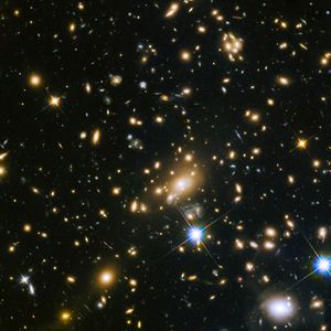Large sample galaxies of different sizes and shapes, experiencing a lens-like distortion.